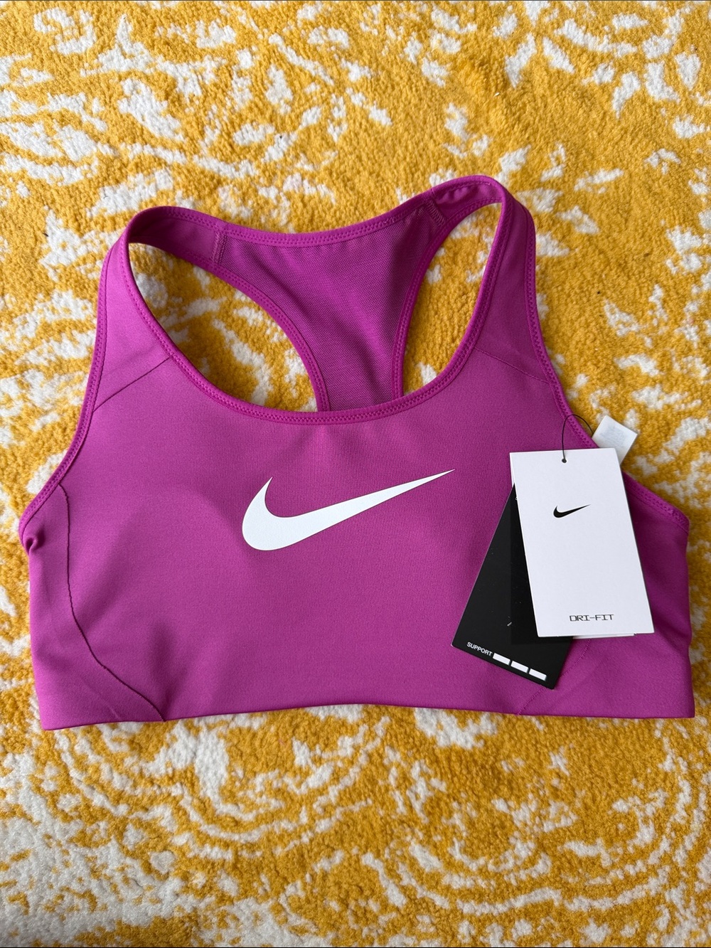 Nike Women's Berry Pink Racerback Sports Bra with White Swoosh